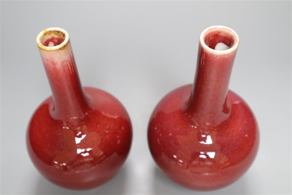 A pair of Chinese sang-de-boeuf vases, height 19cm